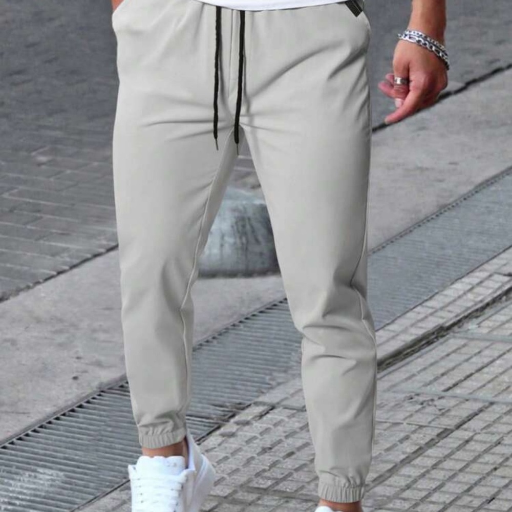 Manfinity Homme Men's Solid Color Drawstring Waist Pocketed Long Pants Slacks